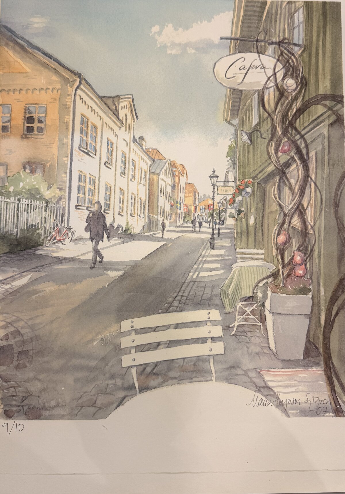 Watercolour painting of Haga Nygata in Gothenburg showing the Caféva sign, cobblestone street and charming wooden houses